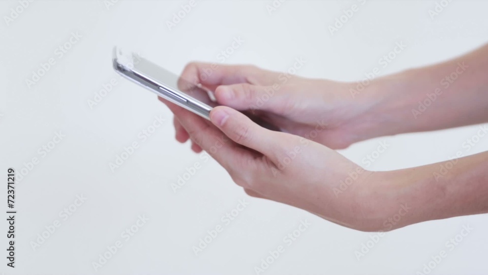 hand using writing on smart phone on white background hand using writing on smart phone on white background