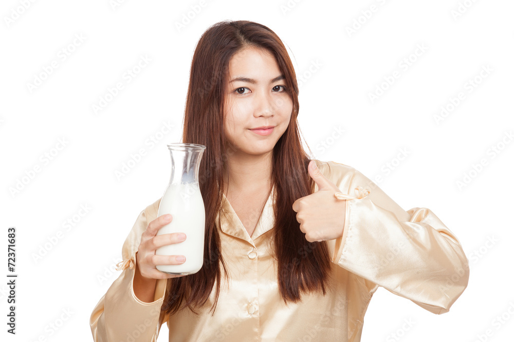 Happy Asian woman thumbs up drink milk in morning Happy Asian woman thumbs up drink milk in morning