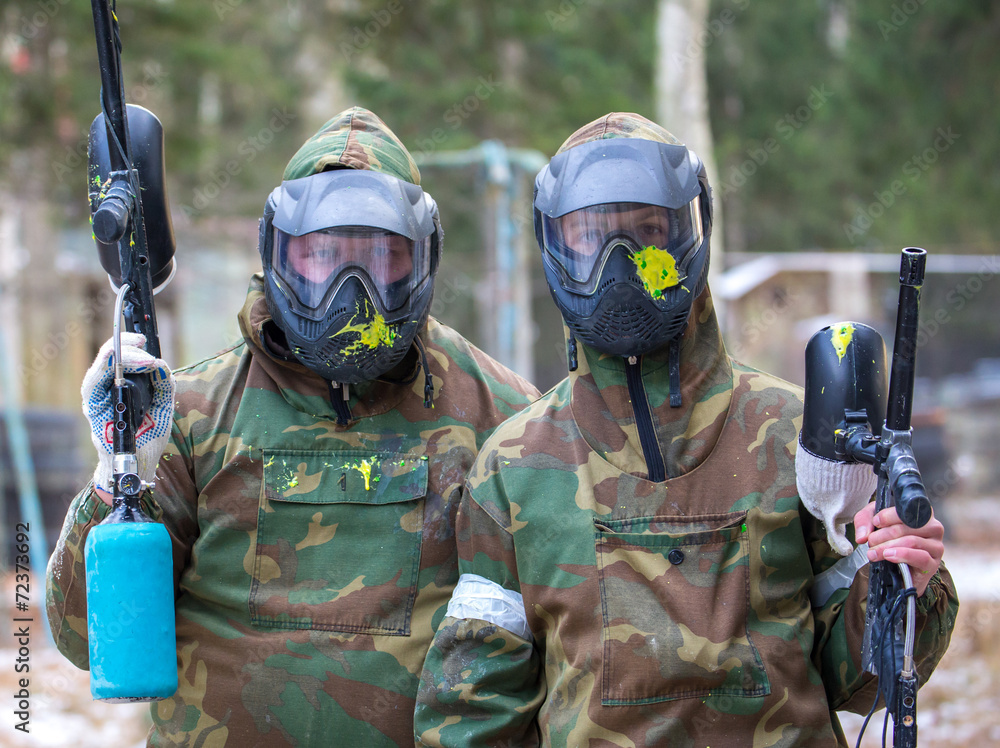Two paintball players with headshots Stock 写真 Adobe Stock