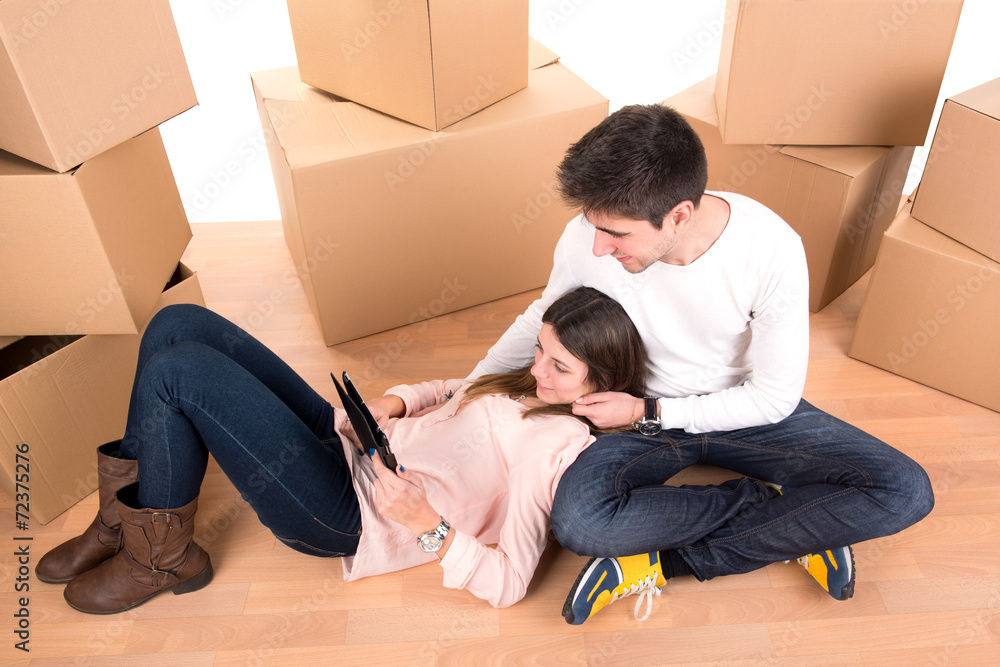 Happy couple with boxes Happy couple with boxes