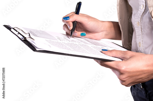 Close up of woman hands holding clipboard