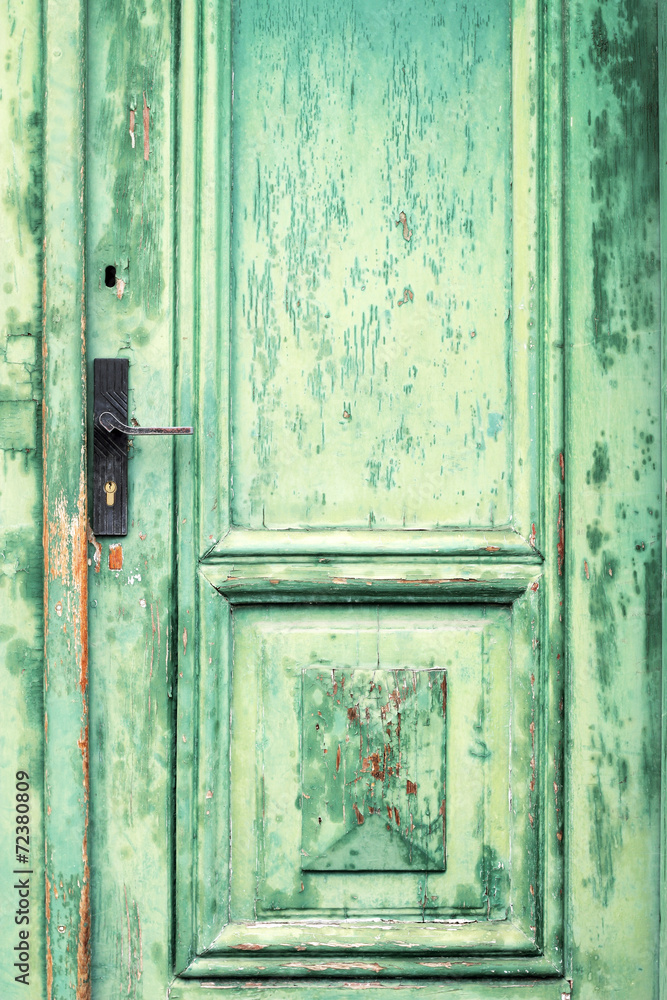 Old and weathered green door texture