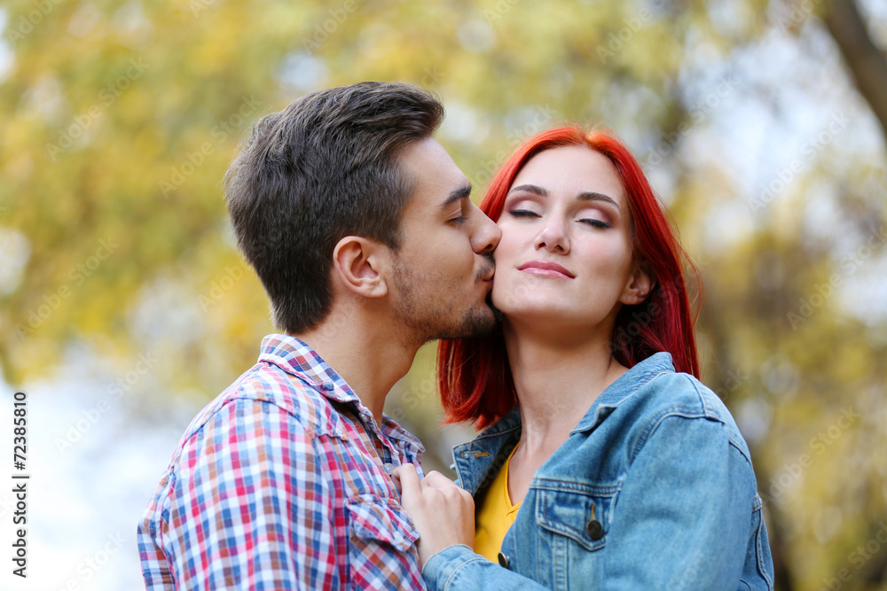 Loving couple in autumn park Loving couple in autumn park
