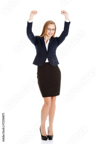 Cheering businesswoman