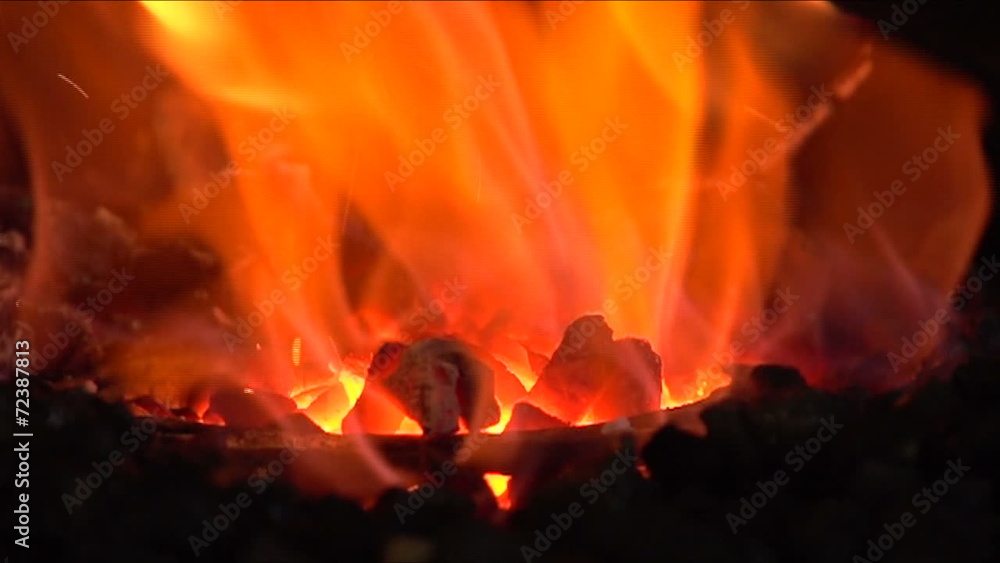 Forging a fire for heating metal, slow motion 1 Forging a fire for heating metal, slow motion 1