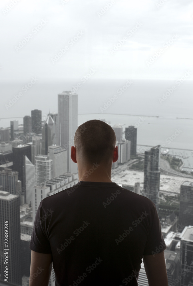 Men standing on the rooftop Men standing on the rooftop