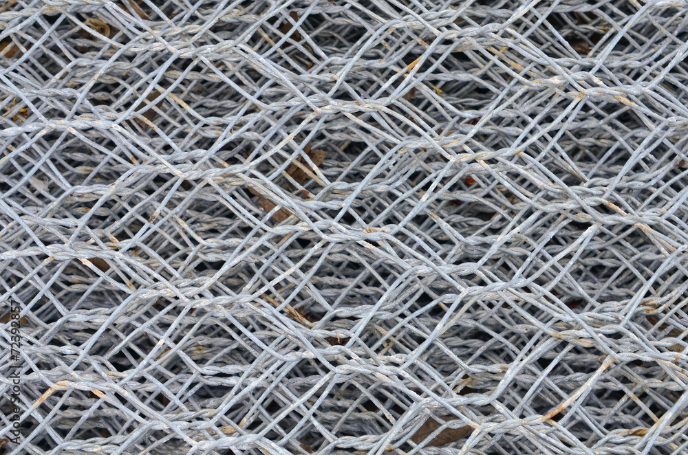 steel iron raw wire fence texture in a warehouse