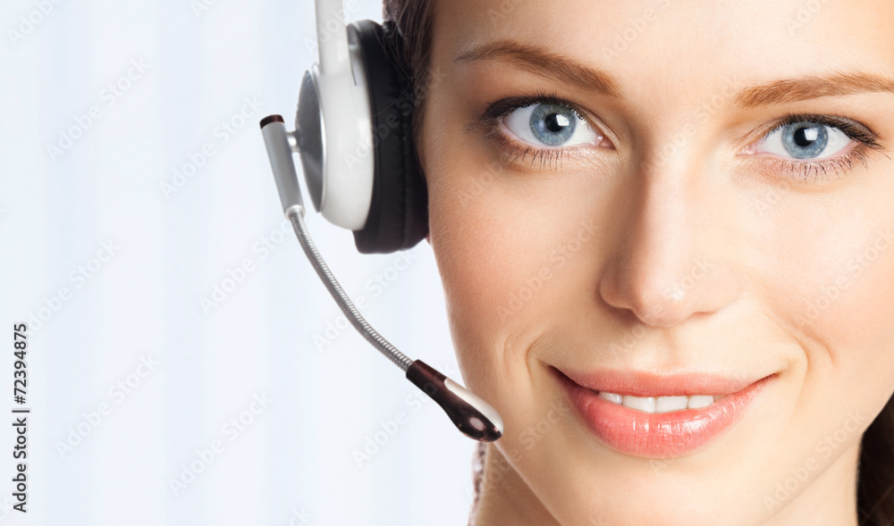 Support phone operator in headset, at office Support phone operator in headset, at office