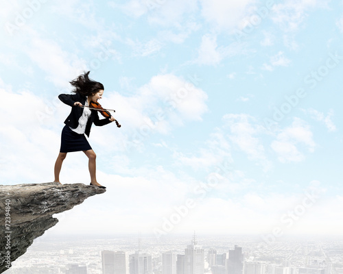 Businesswoman with violin