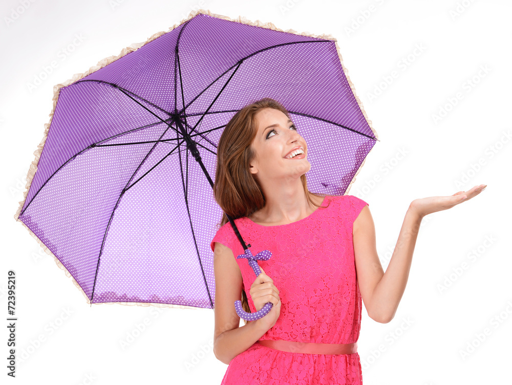 Fototapeta premium Beautiful young girl with umbrella isolated on white