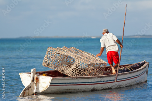 pêcheur rodriguais et sa "gal" (perche de bois)