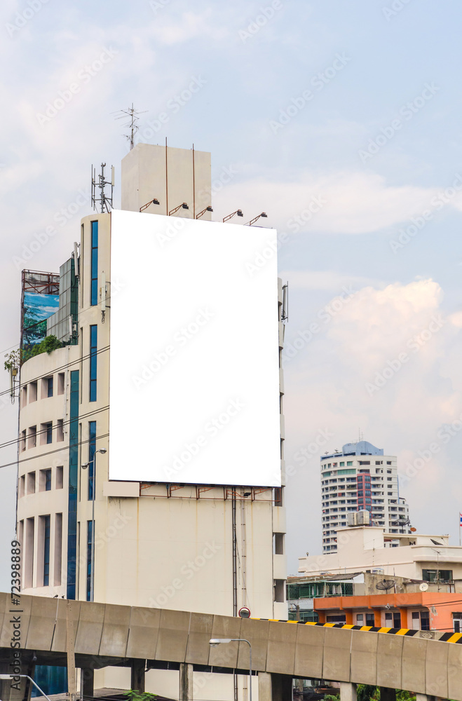 large blank billboard on road with city view background large blank billboard on road with city view background