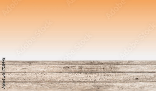 orange background with wooden planks
