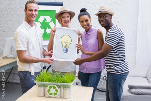 Creative business team holding Idea light bulb in meeting © WavebreakmediaMicro