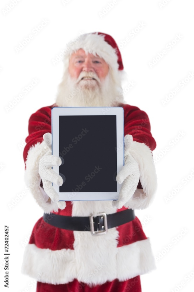 Naklejka premium Santa presents a tablet PC