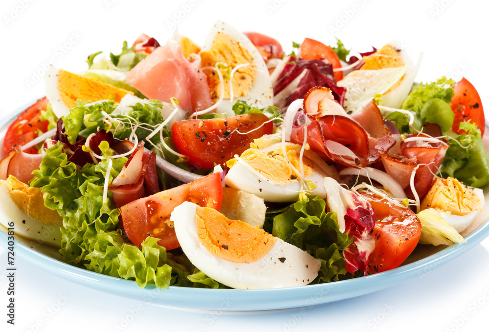 Boiled eggs with smoked ham and vegetables Boiled eggs with smoked ham and vegetables