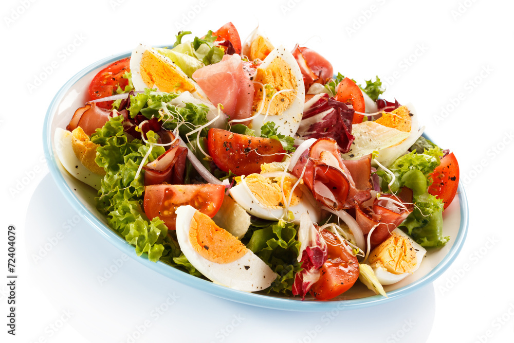 Boiled eggs with smoked ham and vegetables Boiled eggs with smoked ham and vegetables