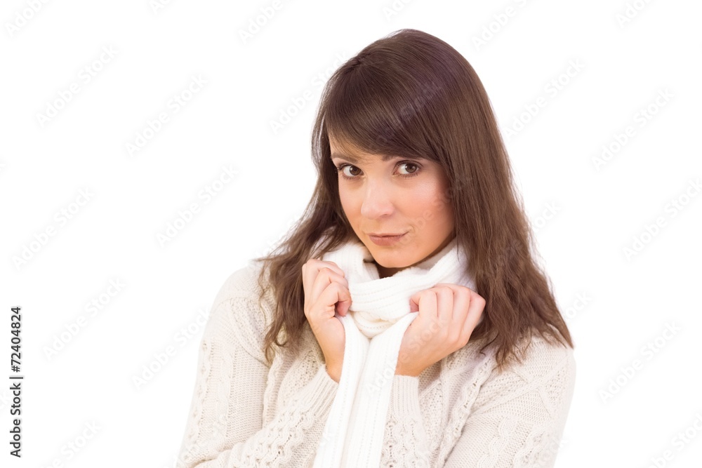 Brunette in winter clothes smiling at camera Brunette in winter clothes smiling at camera