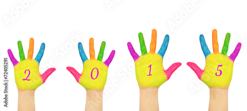 Children hands forming number 2015.