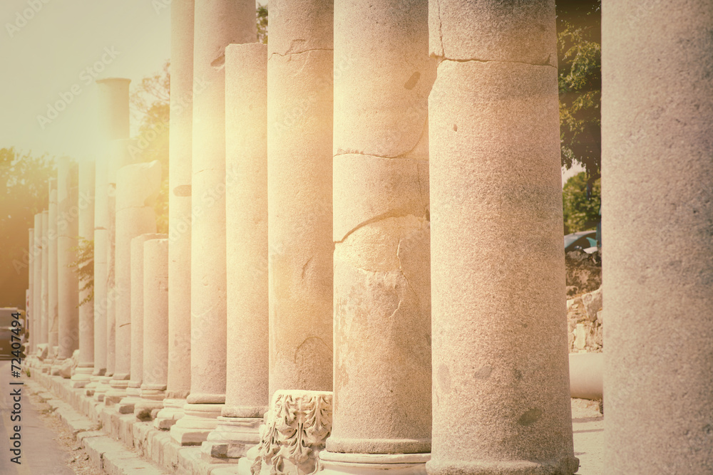 Row of pillars backlit in town Side (Turkey), ancient Roman
