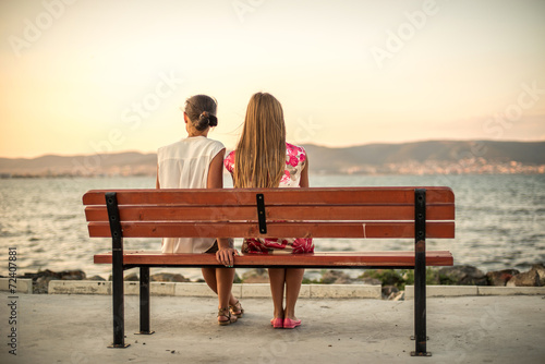 Girls sitting on the bench