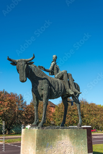 Statue of a naked man on bull in the downtown of Magdeburg  Germ
