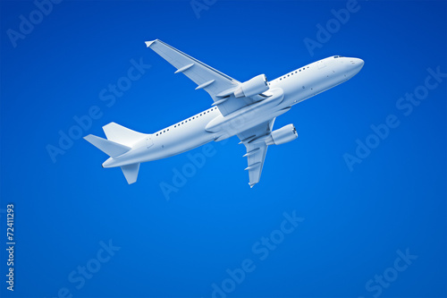 Airplane in the blue sky