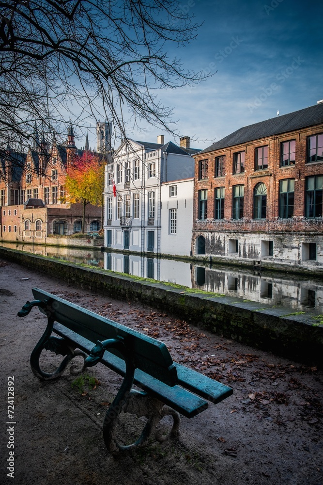 Bench near canal in Bruges, Belgium