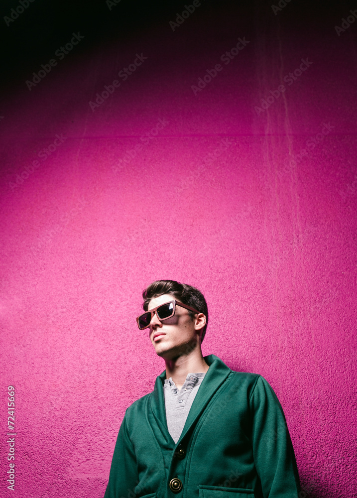 Fototapeta premium Model portrait over fuchsia background