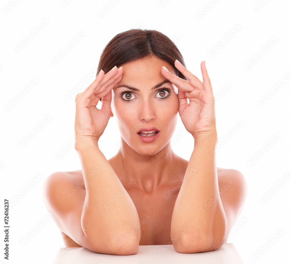Beautiful hispanic woman touching her face Beautiful hispanic woman touching her face