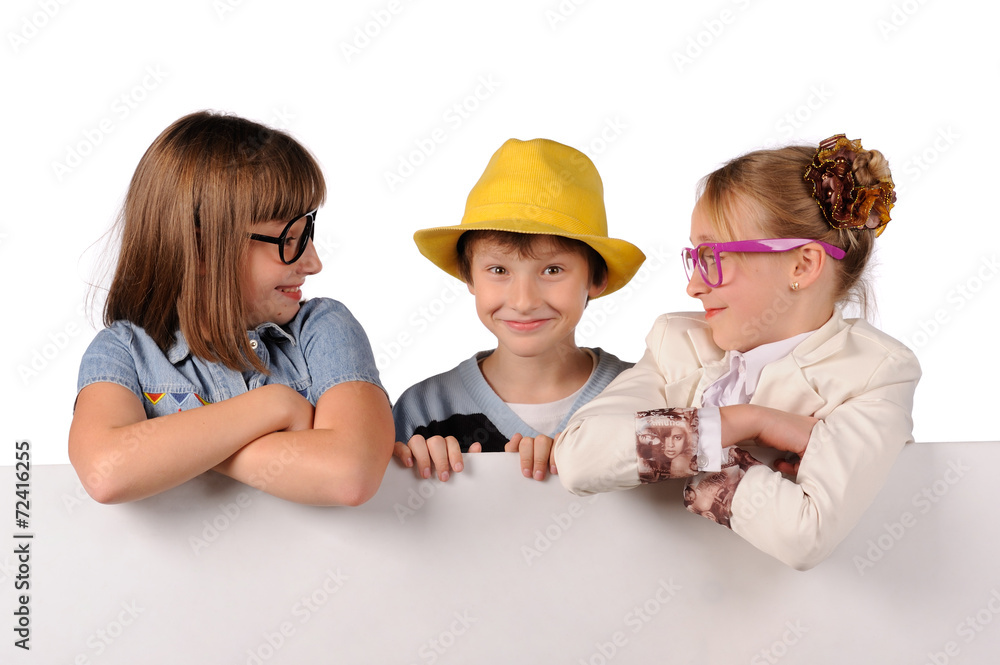 Portrait of happy children with white blank Portrait of happy children with white blank