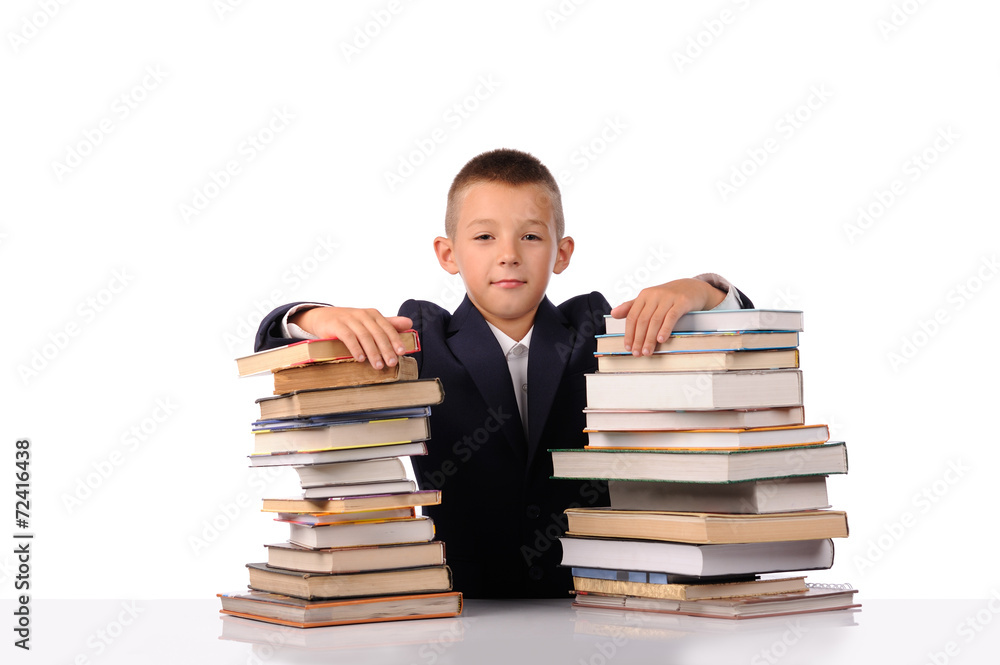 Schoolboy with huge stack of books Schoolboy with huge stack of books