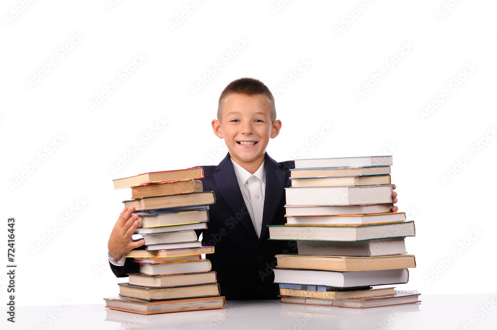 Schoolboy with huge stack of books Schoolboy with huge stack of books