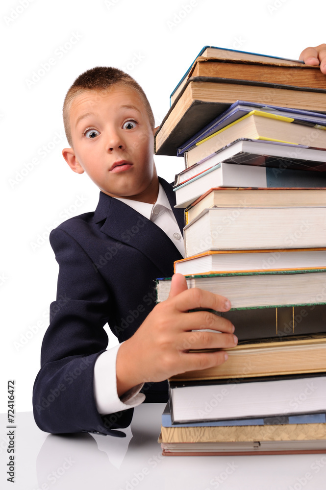 surprised schoolboy with huge stack of books surprised schoolboy with huge stack of books