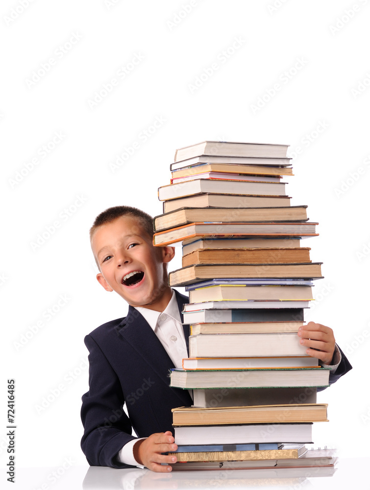 Schoolboy with huge stack of books Schoolboy with huge stack of books