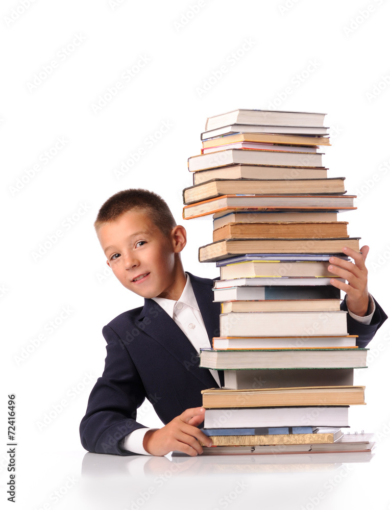 Schoolboy with huge stack of books Schoolboy with huge stack of books