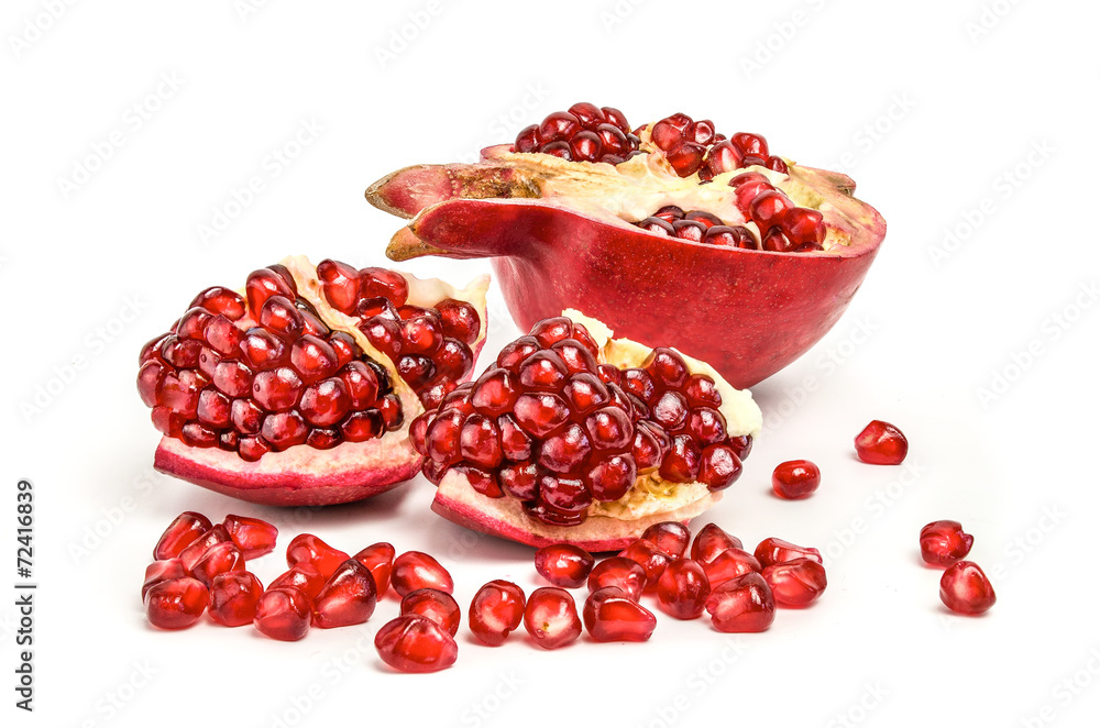 ripe red pomegranate on a white background ripe red pomegranate on a white background