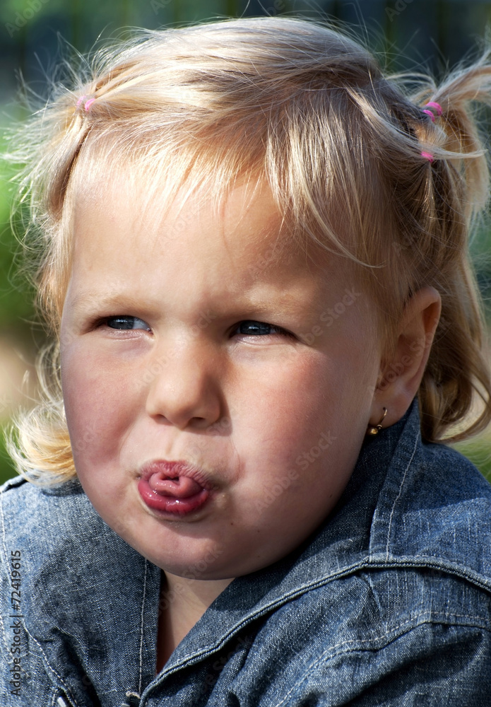Little girl make faces Little girl make faces