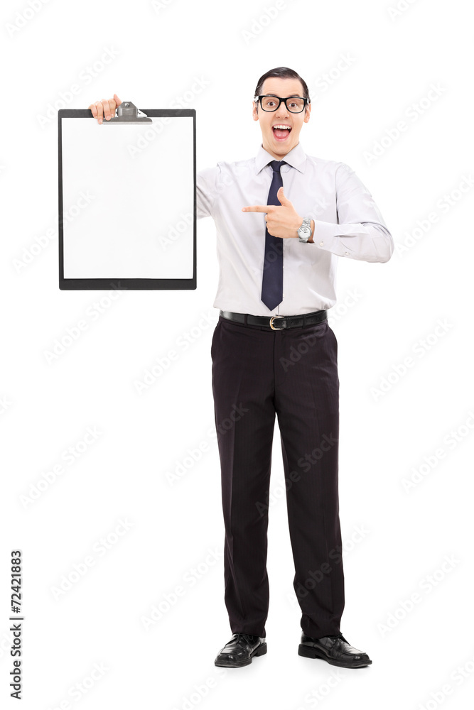 Happy business guy pointing on a clipboard Happy business guy pointing on a clipboard