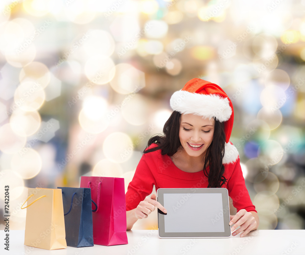 smiling woman with shopping bags and tablet pc smiling woman with shopping bags and tablet pc