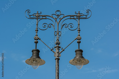 Classic Old Street Lamp On Blue Sky