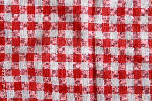 Texture of a red and white checkered picnic blanket