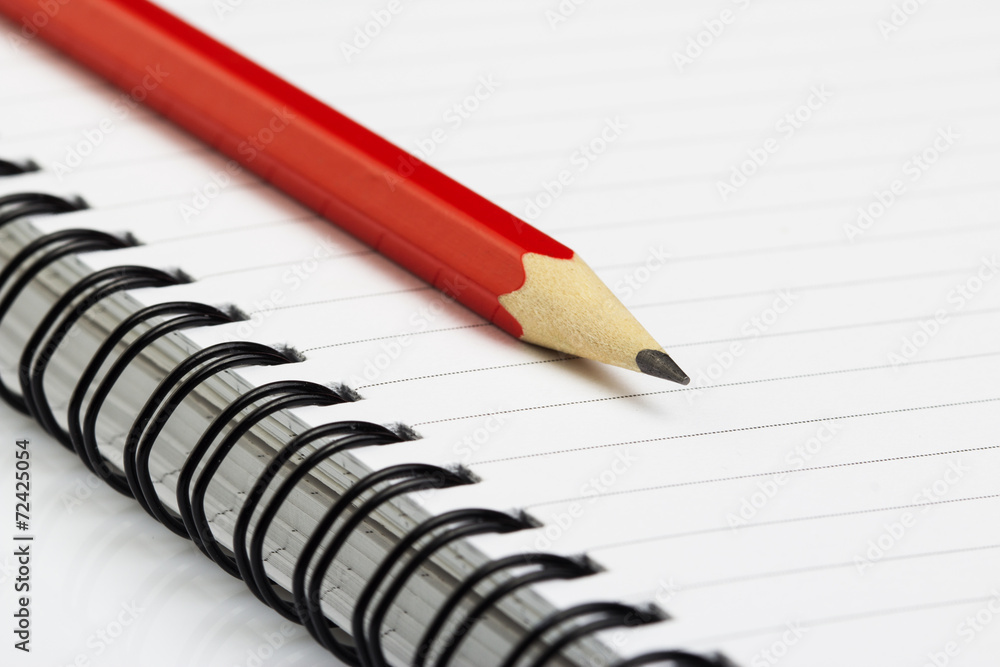 sketch book with pencil on white background sketch book with pencil on white background