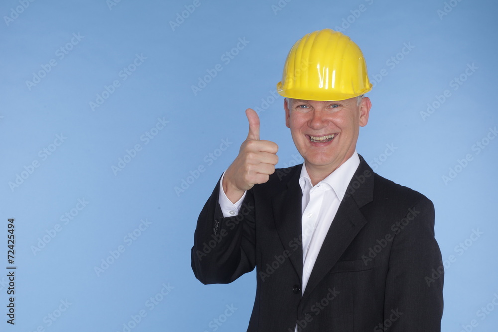 architect smiling blue background architect smiling blue background