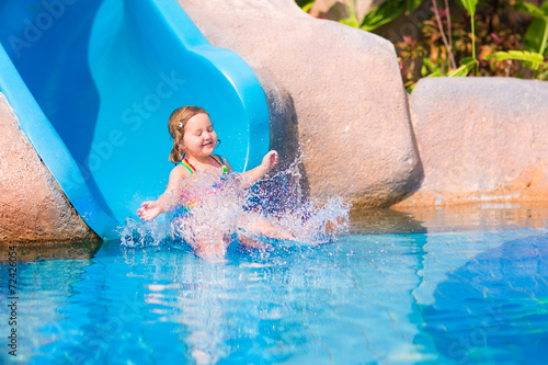 Child on water slide © famveldman