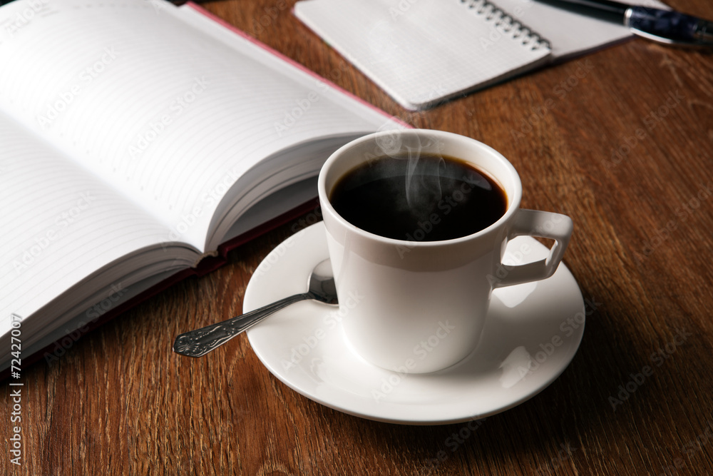 business still life with cup of black coffee