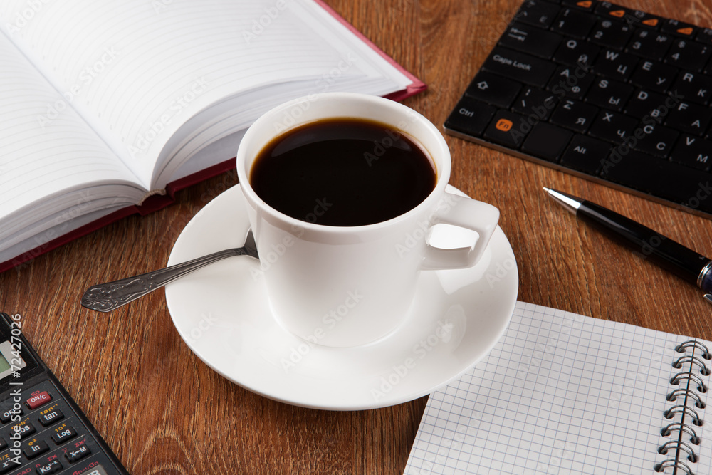 business still life with cup of black coffee business still life with cup of black coffee