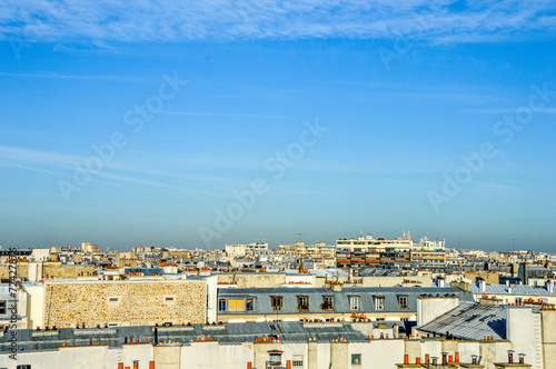 Paris roofs skyline during sunny blue sky day © ofirperetz