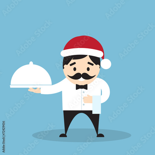Chef in Santa's hat with cloche and towel