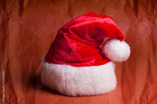 Santa Claus red hat on red background